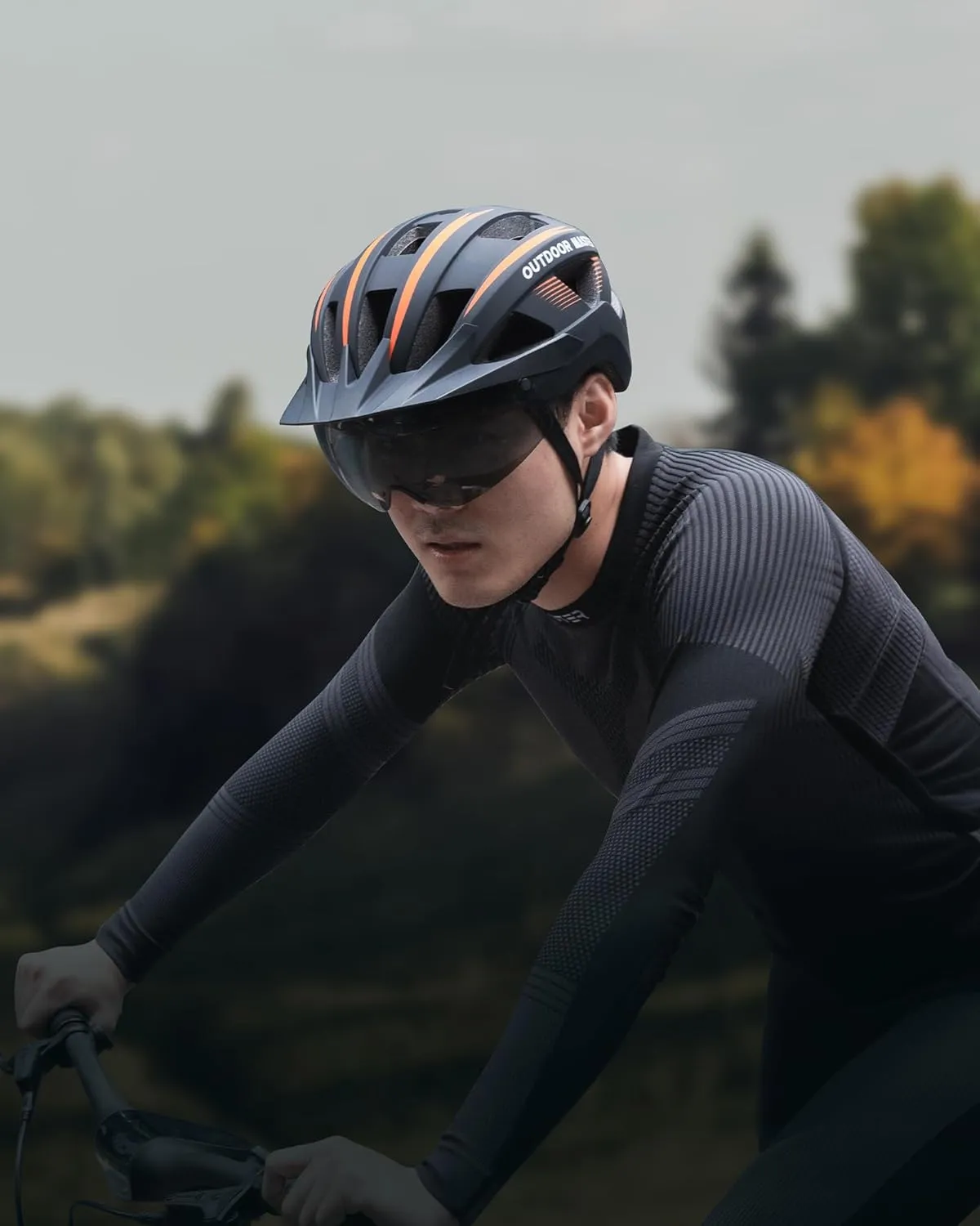 OutdoorMaster Adult Bike Helmet - Bicycle Helmet with Rechargeable Rear LED Light, Detachable Magnetic Goggles, Removable Sun Visor - Suitable for Commuting and Cycling for Men and Women