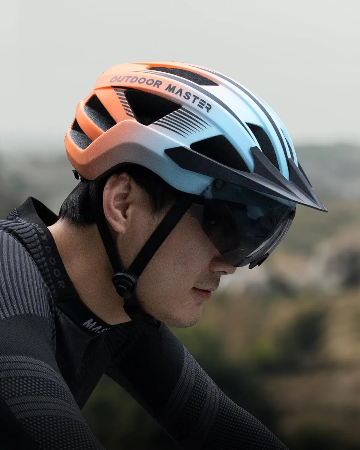 OutdoorMaster Adult Bike Helmet - Bicycle Helmet with Rechargeable Rear LED Light, Detachable Magnetic Goggles, Removable Sun Visor - Suitable for Commuting and Cycling for Men and Women